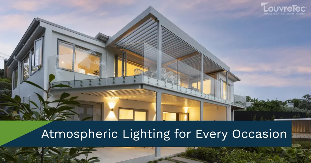  Louvretec opening roof creates an inviting outdoor room with atmospheric lighting at dusk.