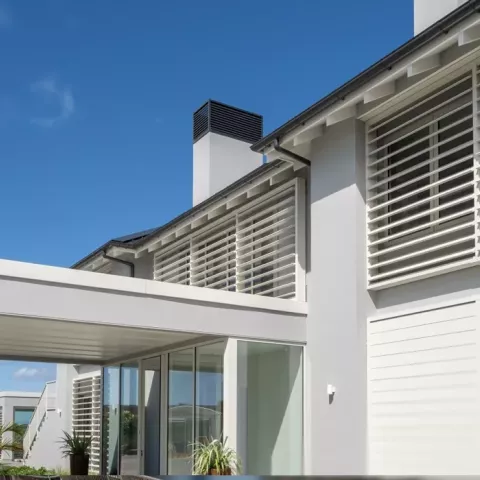Louvretec rectangular sun louvres used as horizontal privacy screens and facade panels on a contemporary Australian home.