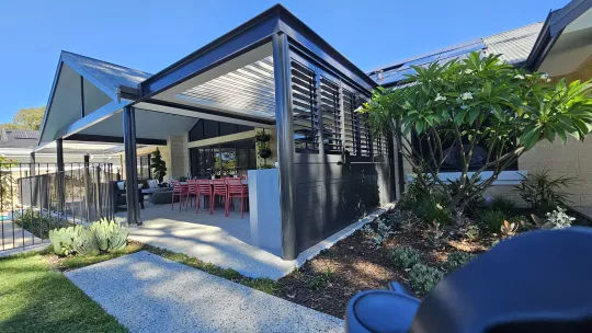 Retract Roof in the overhead position creating an outdoor room, by Louvretec Perth