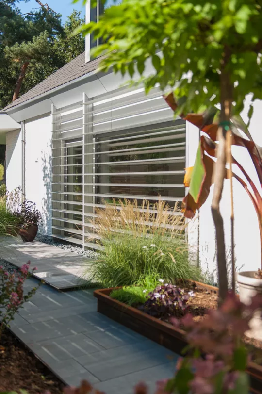 Aluminium Coastal Shutters bringing operable shade and privacy control